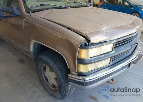 1997 Chevrolet K1500 Fleetside z USA, uszkodzony, nr VIN 2GCEK19R2V1270771